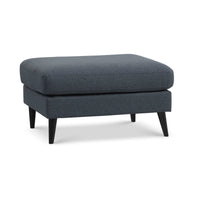 Nebraska puf fra Lexpo i navy blå møbelstof og sortbejdset eg
