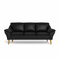 Fly 3-personers sofa fra BD monteret med sort 8000 semianilin okselæder. Ben i naturolieret eg.