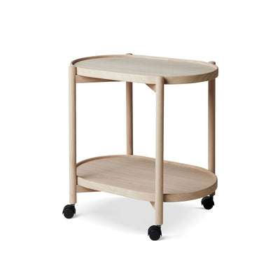 James oval rullebord fra Thomsen Furniture i enten ubehandlet eller hvidolieret egetræ og på hjul
