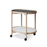 James oval rullebord fra Thomsen Furniture i ubehandlet eg med overflade i melamin og på hjul