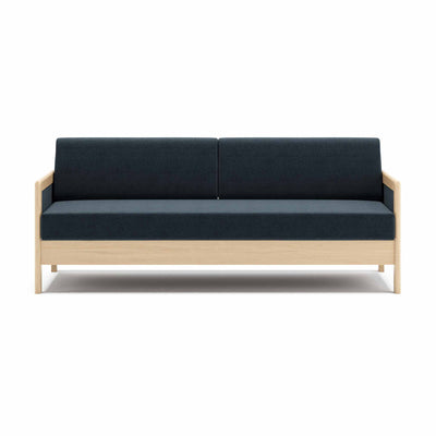 Hestbæk 145 sovesofa fra Hestbæk monteret med Denno blue møbelstof. Stel i bøg sæbe.