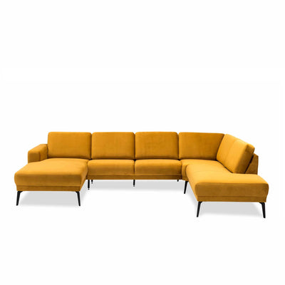 City u-sofa fra Hjort Knudsen i gul velour møbelstof og sorte metalben