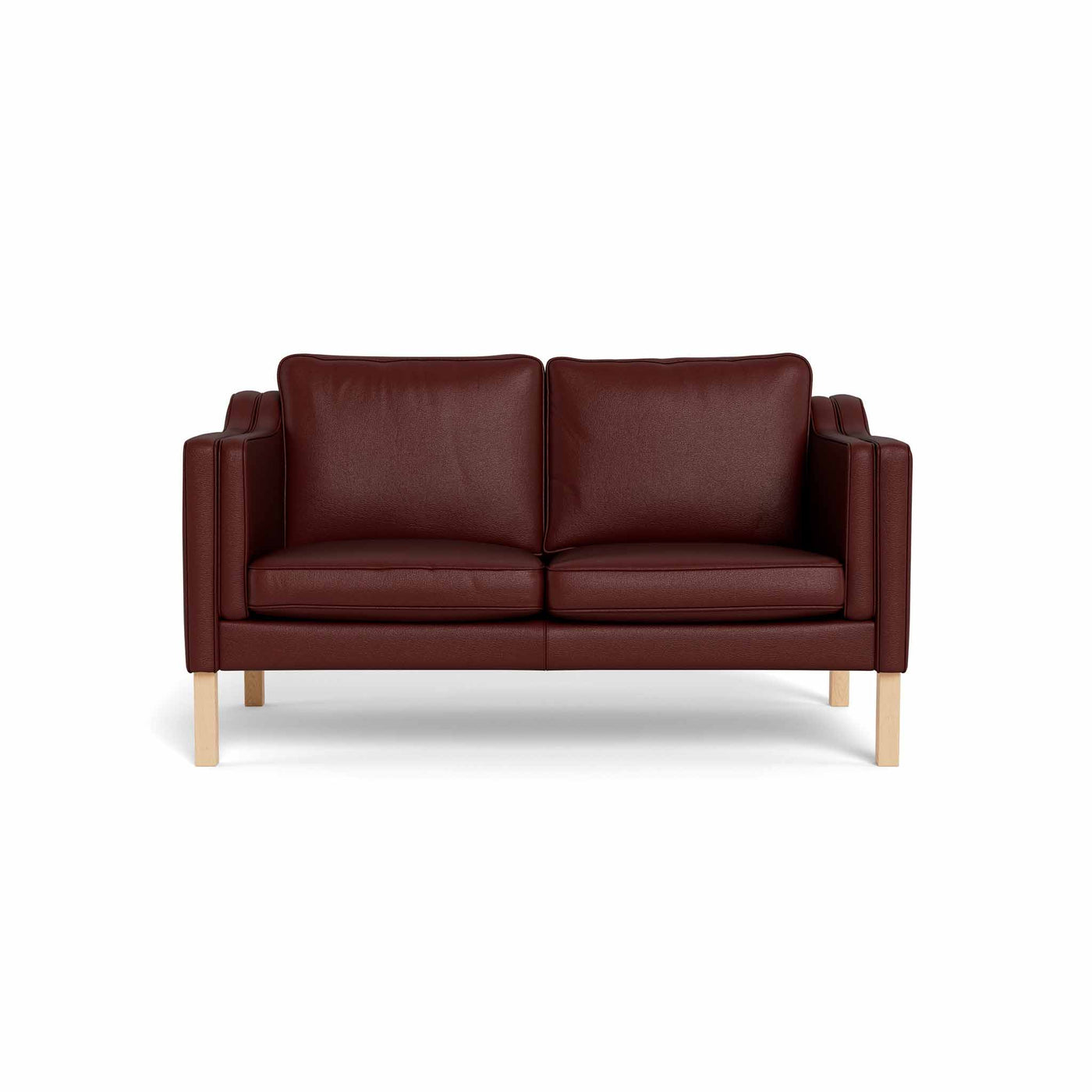 Clausholm 2-pers sofa fra Top-Line monteret med brun semianilin læder og ben i egetræ