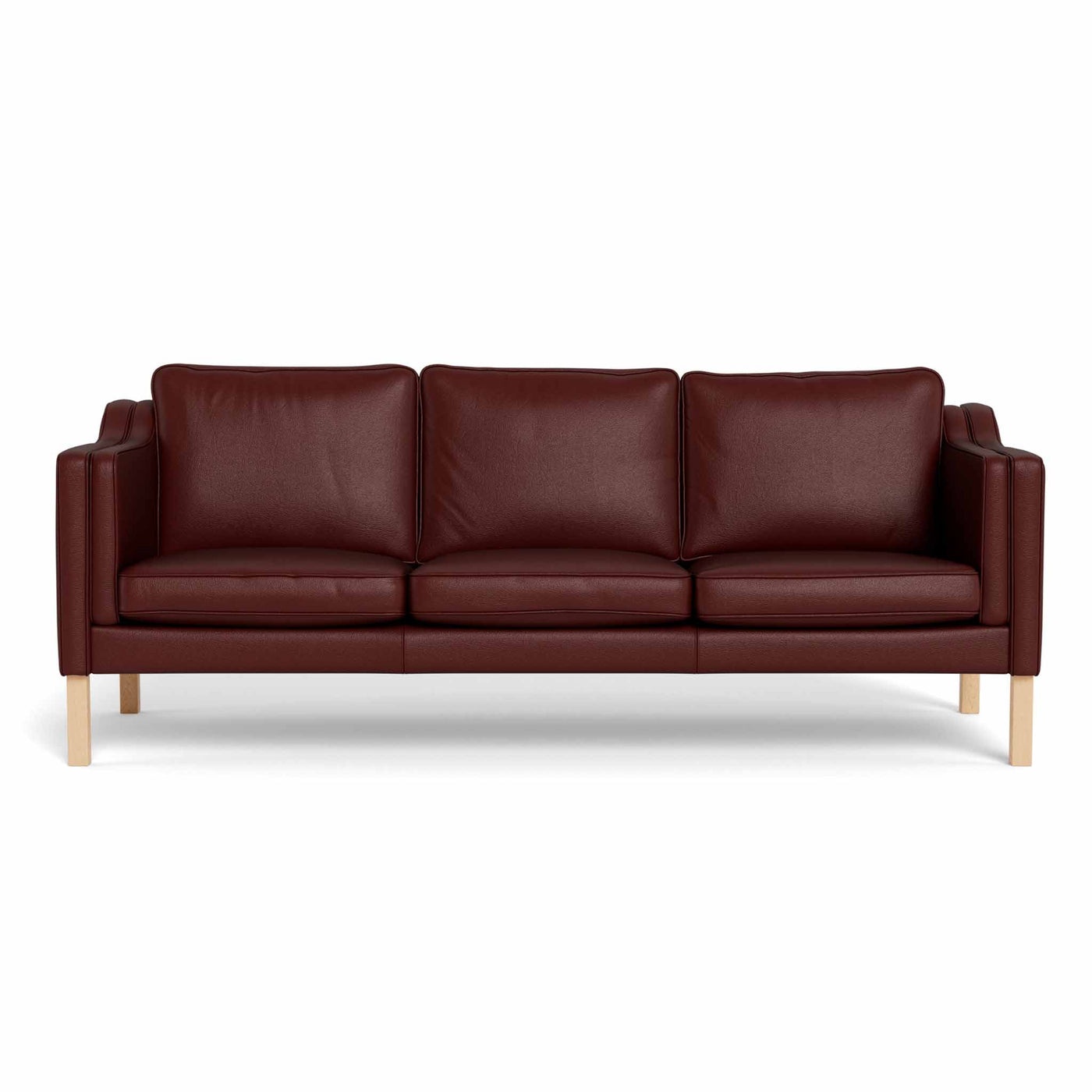 Clausholm 3-pers sofa fra Top-Line monteret med brun semianilin læder og ben i egetræ