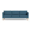 Copenhagen 3-pers sofa fra Skalma monteret med slidstærkt blåt Cosmo møbelstof og ben i naturolieret eg