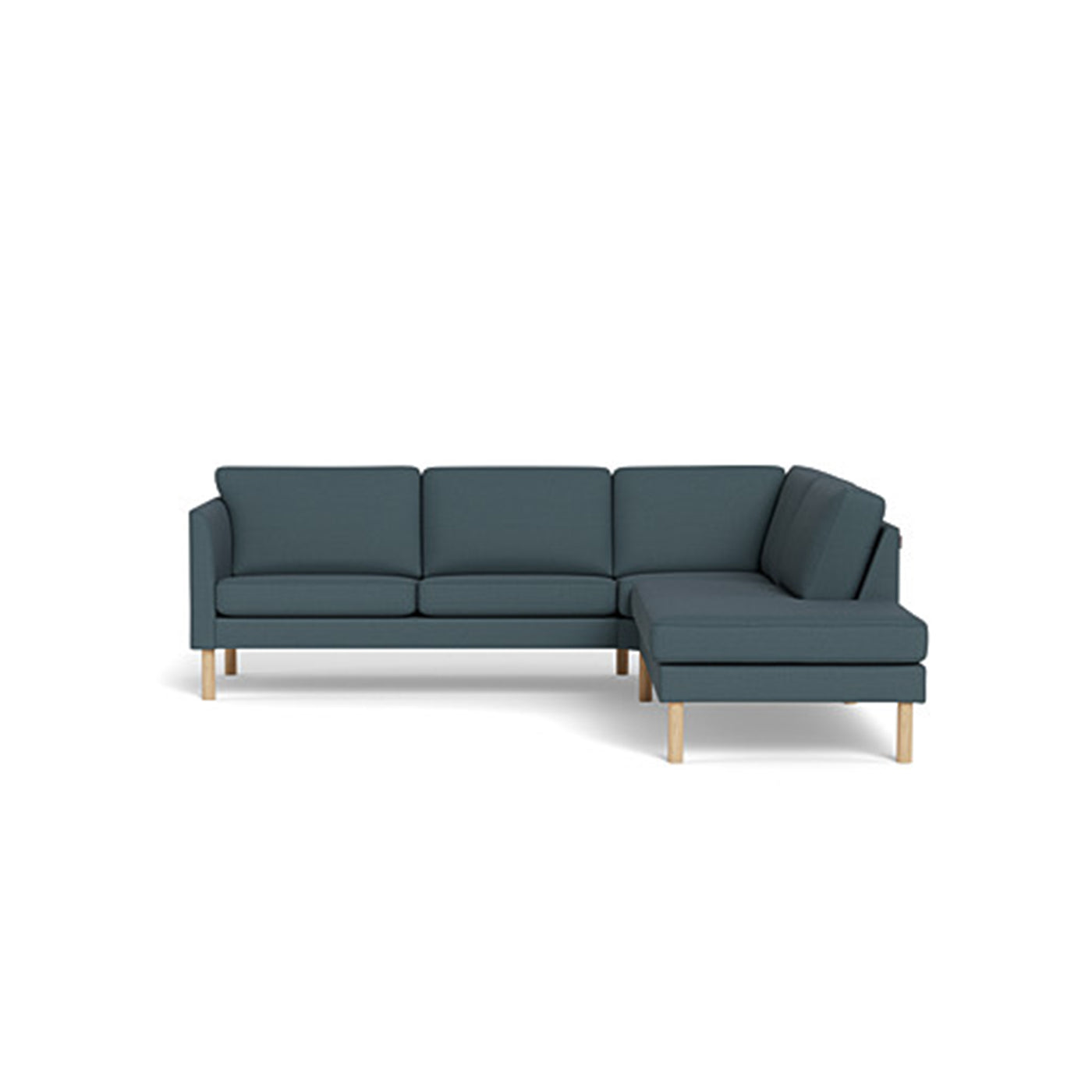 Copenhagen sofa med open-end fra Skalma monteret med petrol Capture møbelstof og ben i egetræ