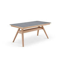 SM 10 spisebord fra Skovby med top i grå sten laminat og ben i hvidolieret eg